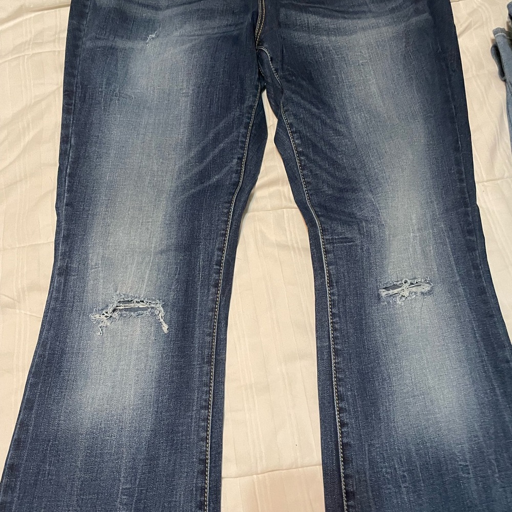 Decree Women's Faded Blue Bootcut Jeans with Knee Distress